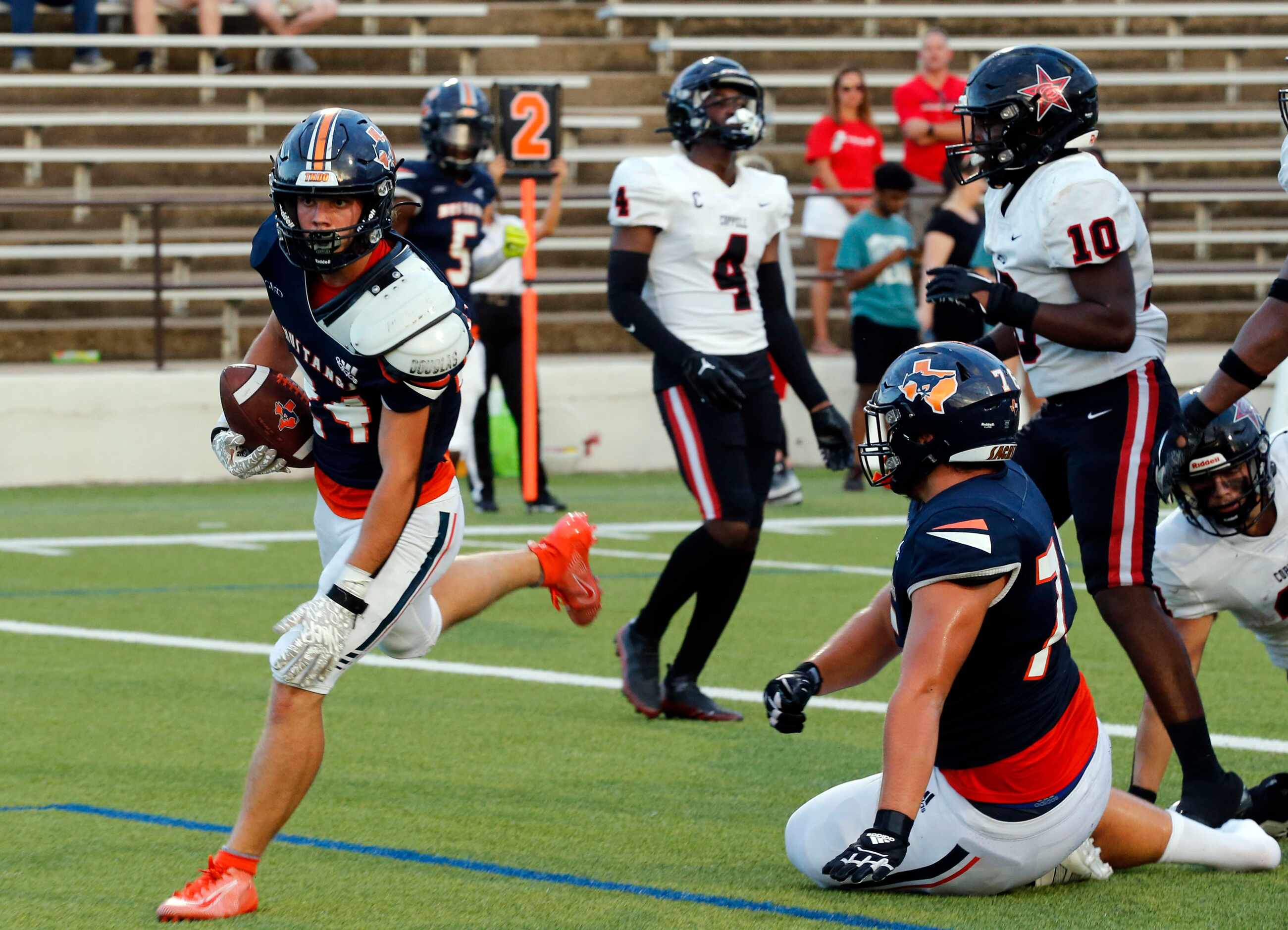 Sachse RB RC Reeves (24) takes the ball in for a touchdown during the first half of a high...
