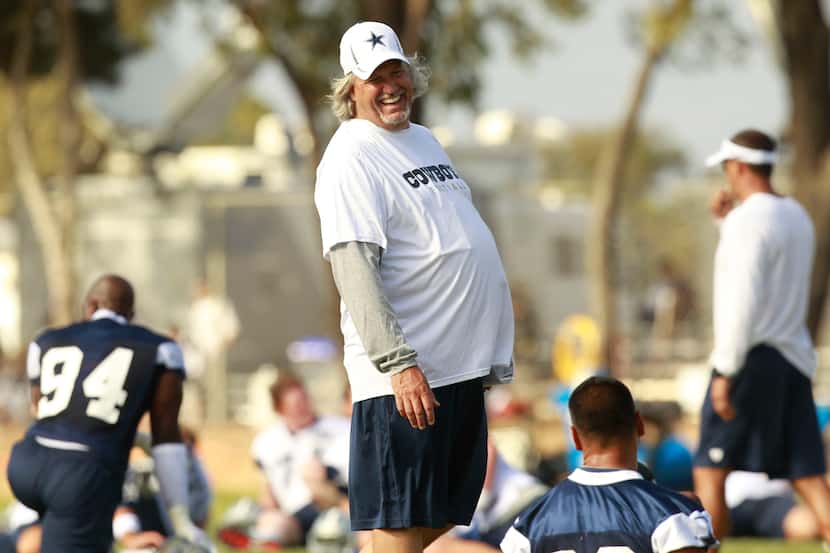 Dallas Cowboys defensive coordinator Rob Ryan laughs after their first afternoon practice at...
