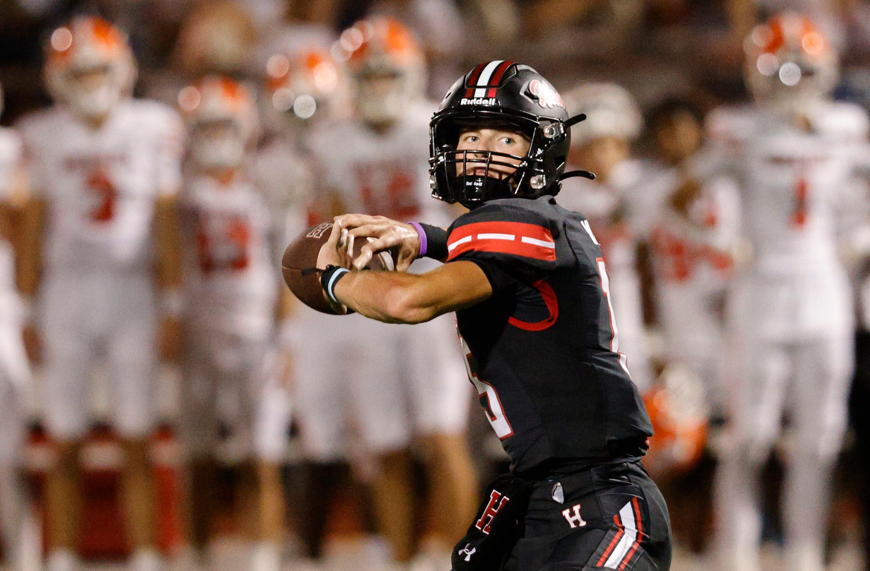 Rockwall-Heath's quarterback Landon Dutka (15) looks to throw the ball during the second...