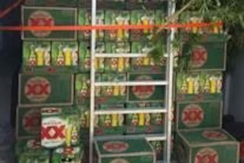 Authorities seized 719 12-packs of allegedly stolen Dos Equis beer from two brothers in...