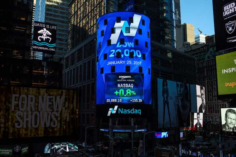 The display at Nasdaq Tower in New York's Times Square shows that the Dow Jones industrial...