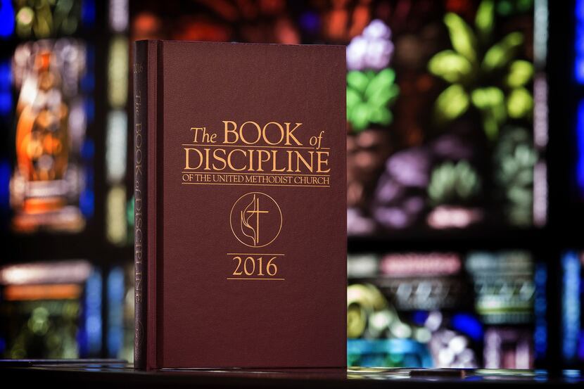This 2017 photo provided by the United Methodist News Service shows the Book of Discipline...