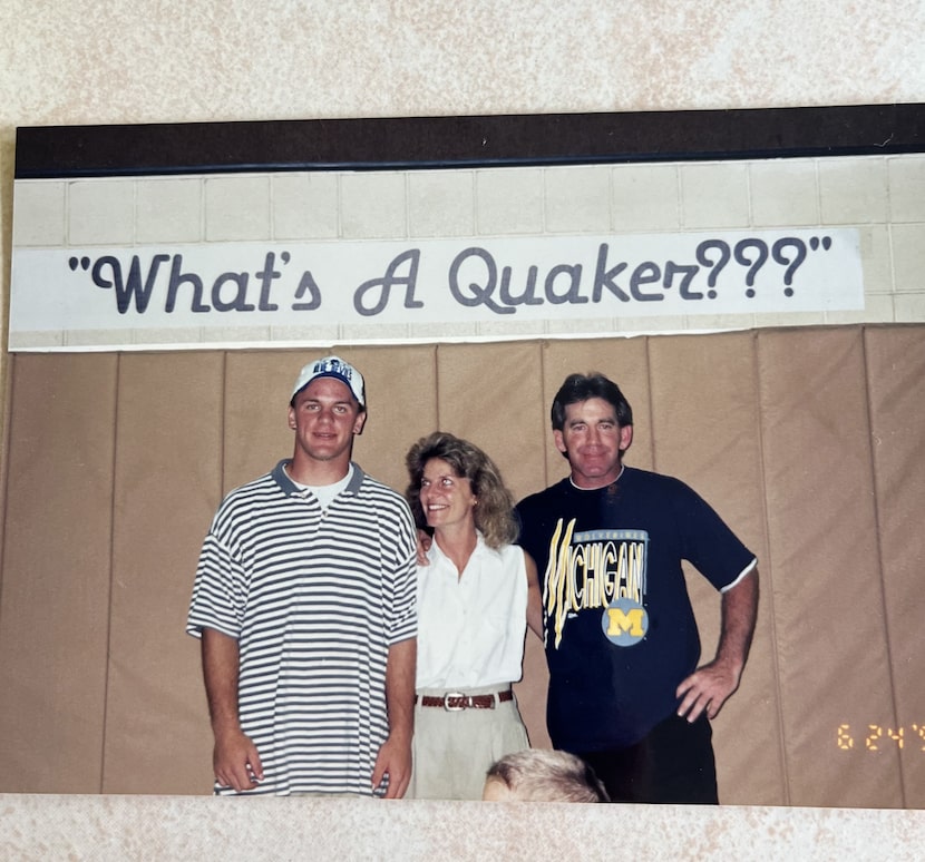 Mike Elko (left) poses for a photo with his parents, Carol Elko (center) and John Elko (right).