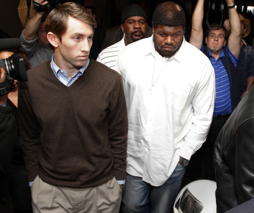 Josh Brent (right) leaves the Dallas County 195th District Court after a bond reduction...