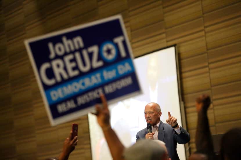 Newly elected District Attorney John Creuzot makes a speech during the Democratic election...