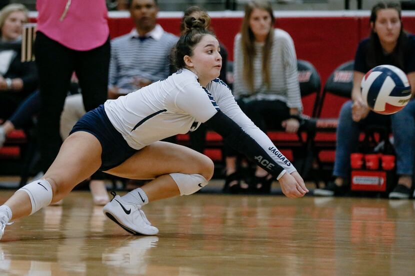 Flower Mound defensive specialist Sarah Martinez digs the ball during a Class 6A area-round...