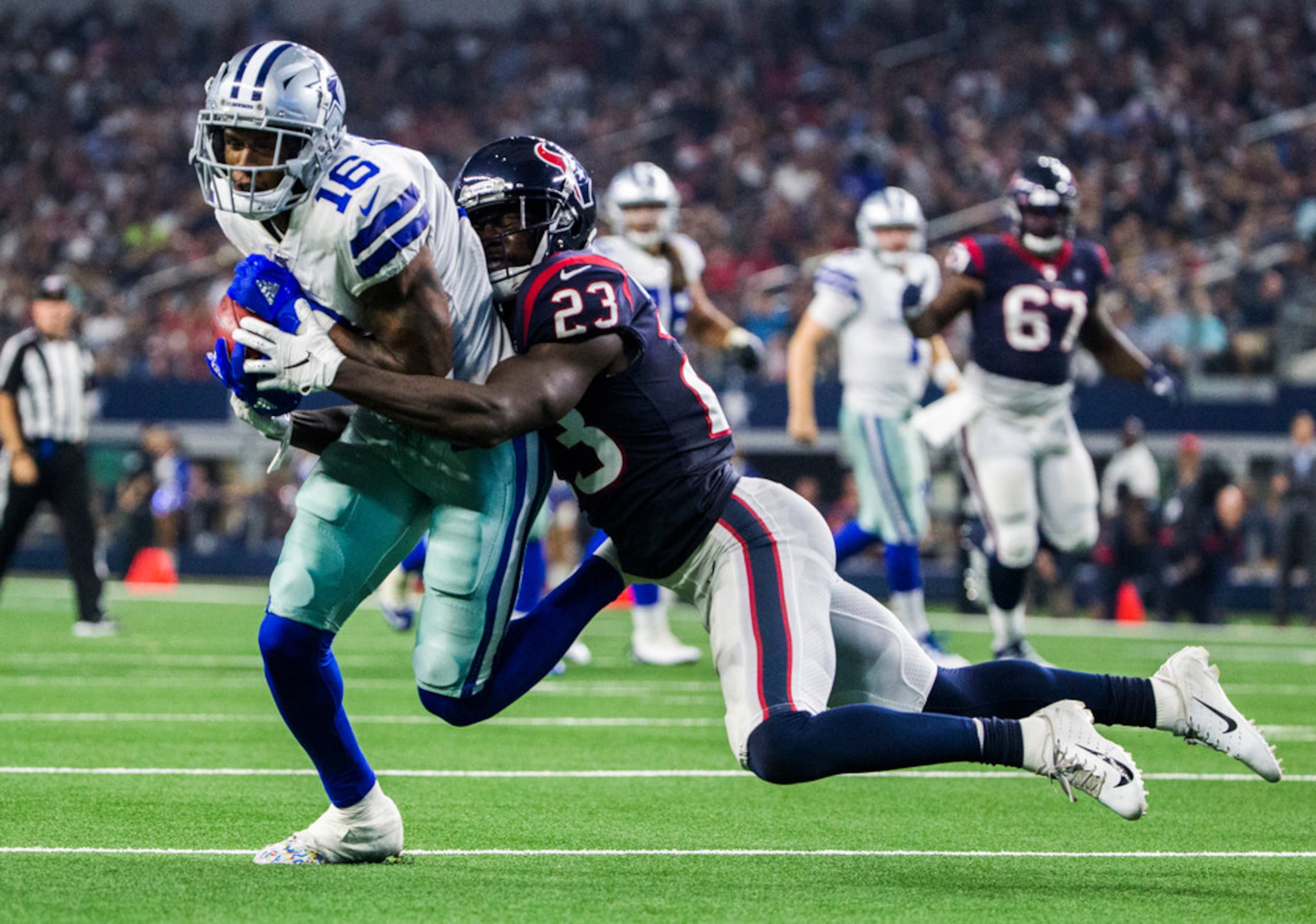 Cowboys WR Cedrick Wilson nursing ankle injury, misses second