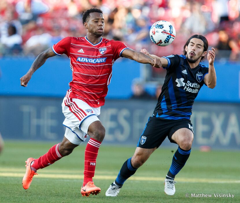 FC Dallas midfielder Kellyn Acosta #23 goes head to head with San Jose's Jahmir Hyka #10.