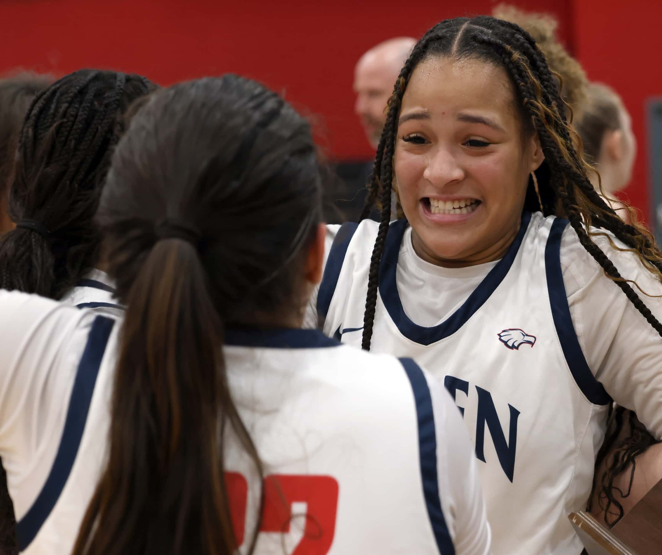 Allen's Aryn Roberts (23), right, celebrates with teammate Audrey Cline (32) following their...