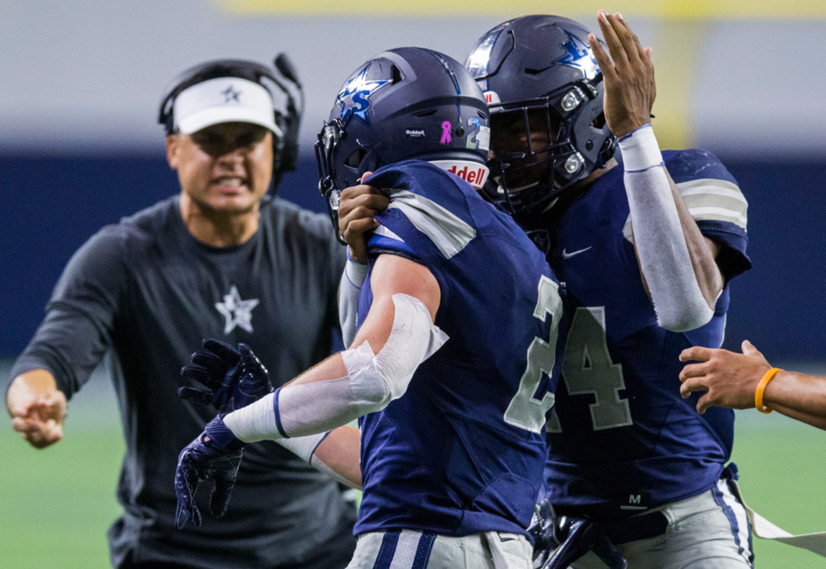 Frisco Lone Star wide receiver Jake Bogdon (2) celebrates a touchdown with quarterback Dylan...