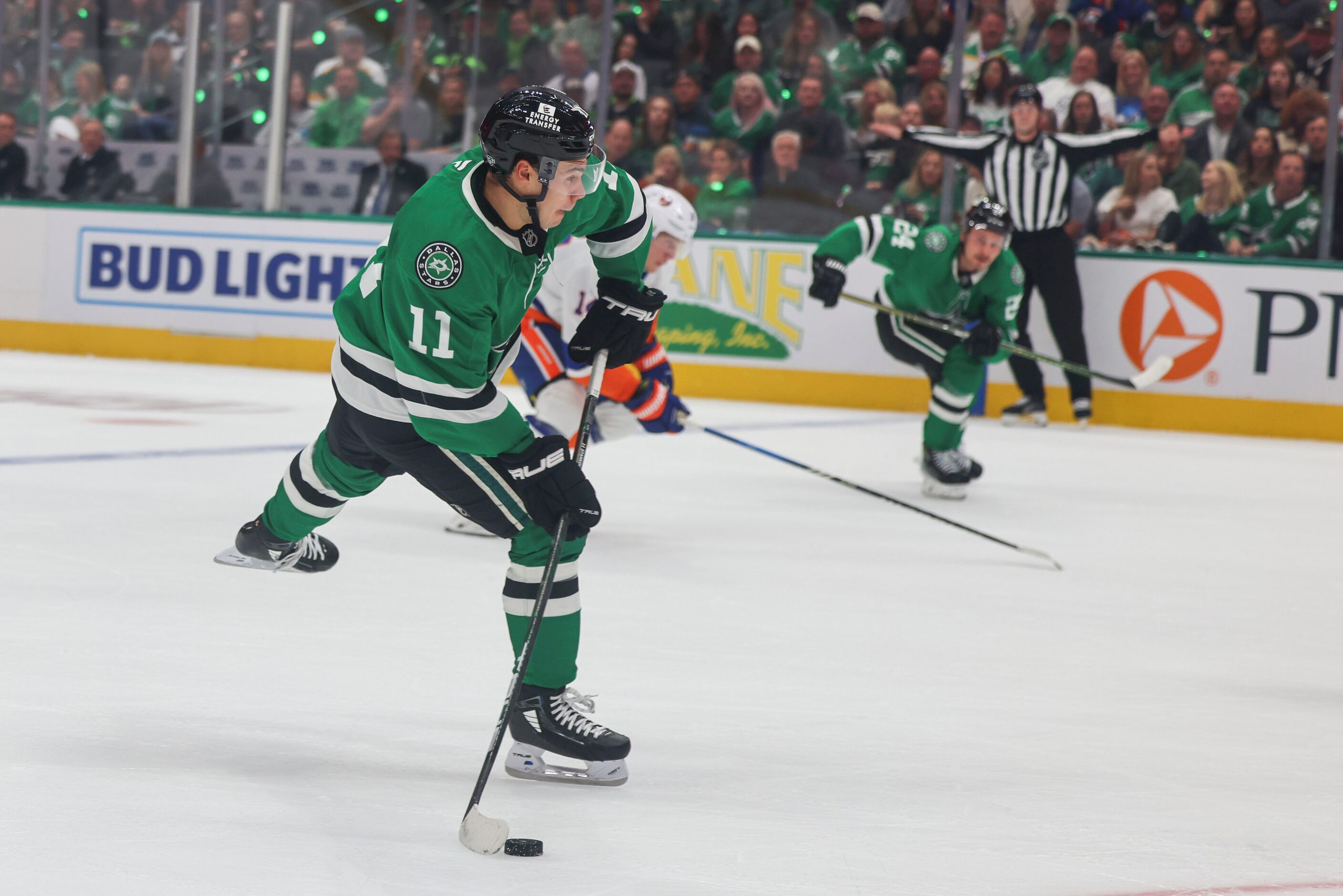 Dallas Stars center Logan Stankoven takes a shot towards the goal during the first period of...