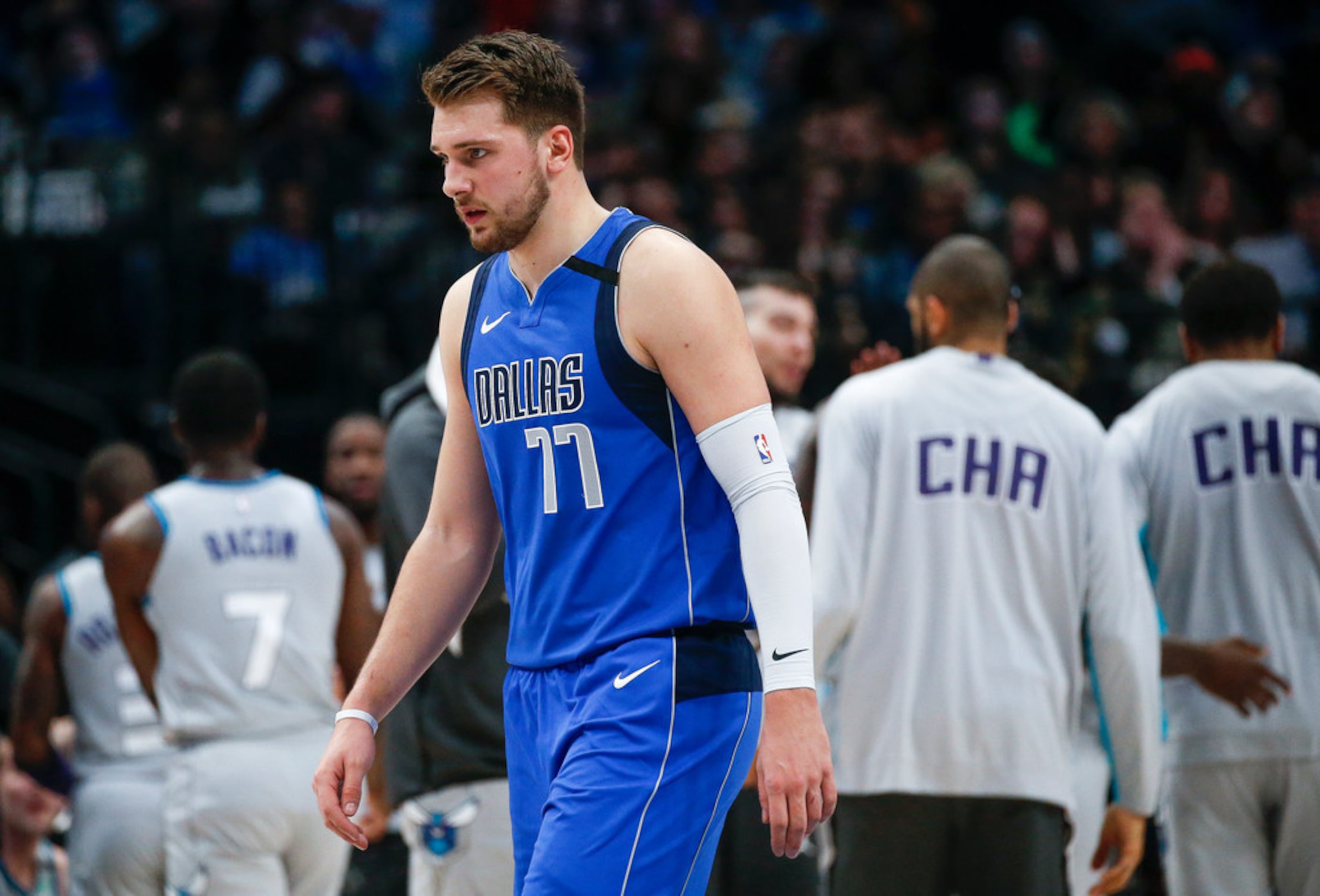 Dallas Mavericks forward Luka Doncic (77) walks off the court at the end of the first...