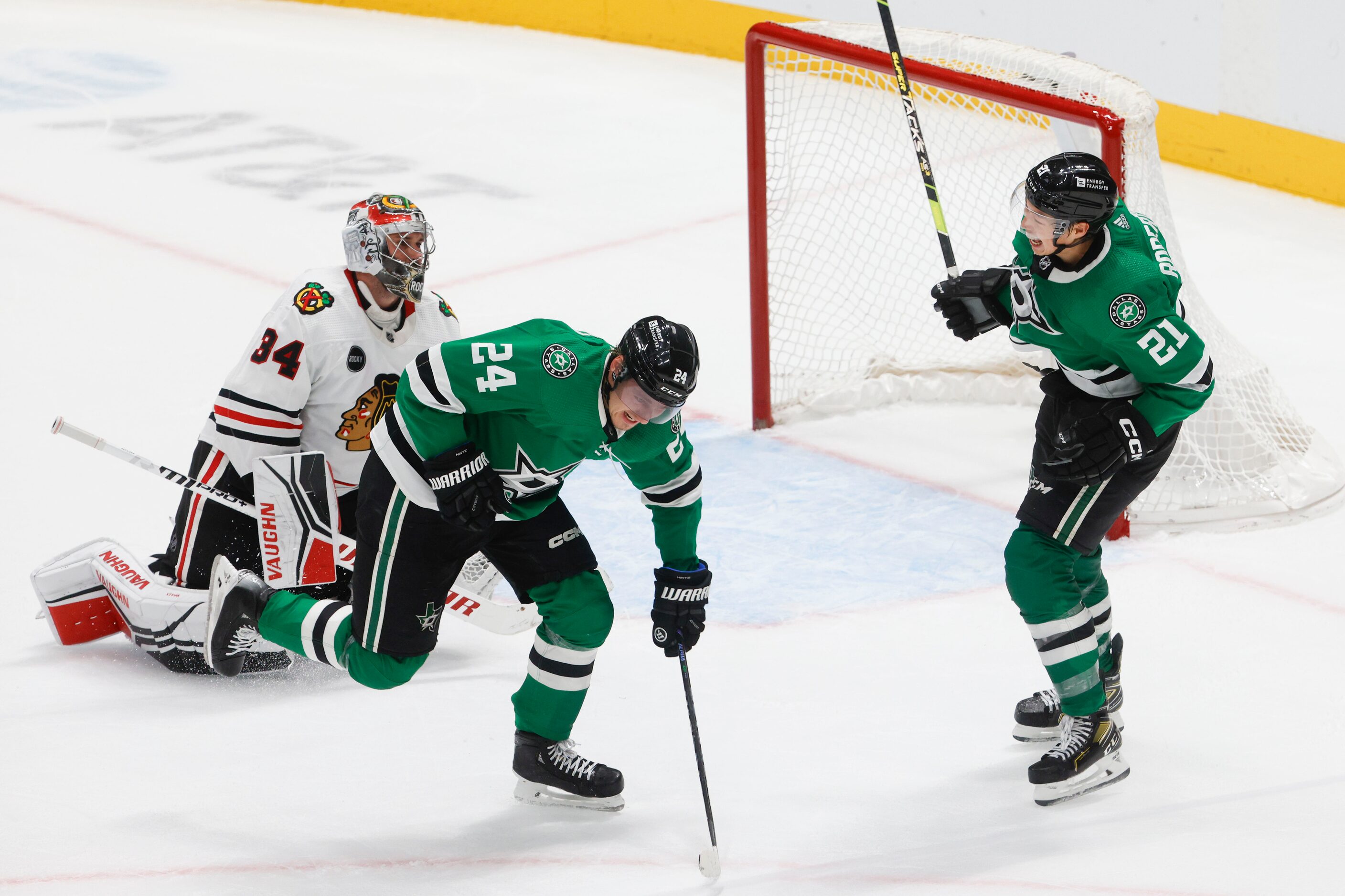 Dallas Stars center Roope Hintz (24) celebrates with left wing Jason Robertson (21) after...