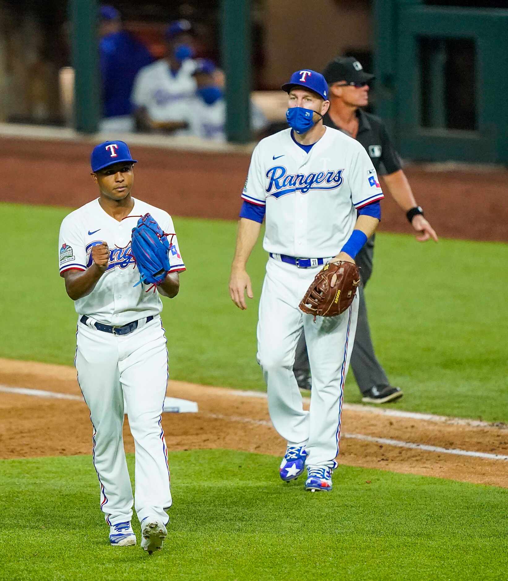 Texas Rangers pitcher Jose Leclerc and first baseman Todd Frazier celebrate after a 1-0...