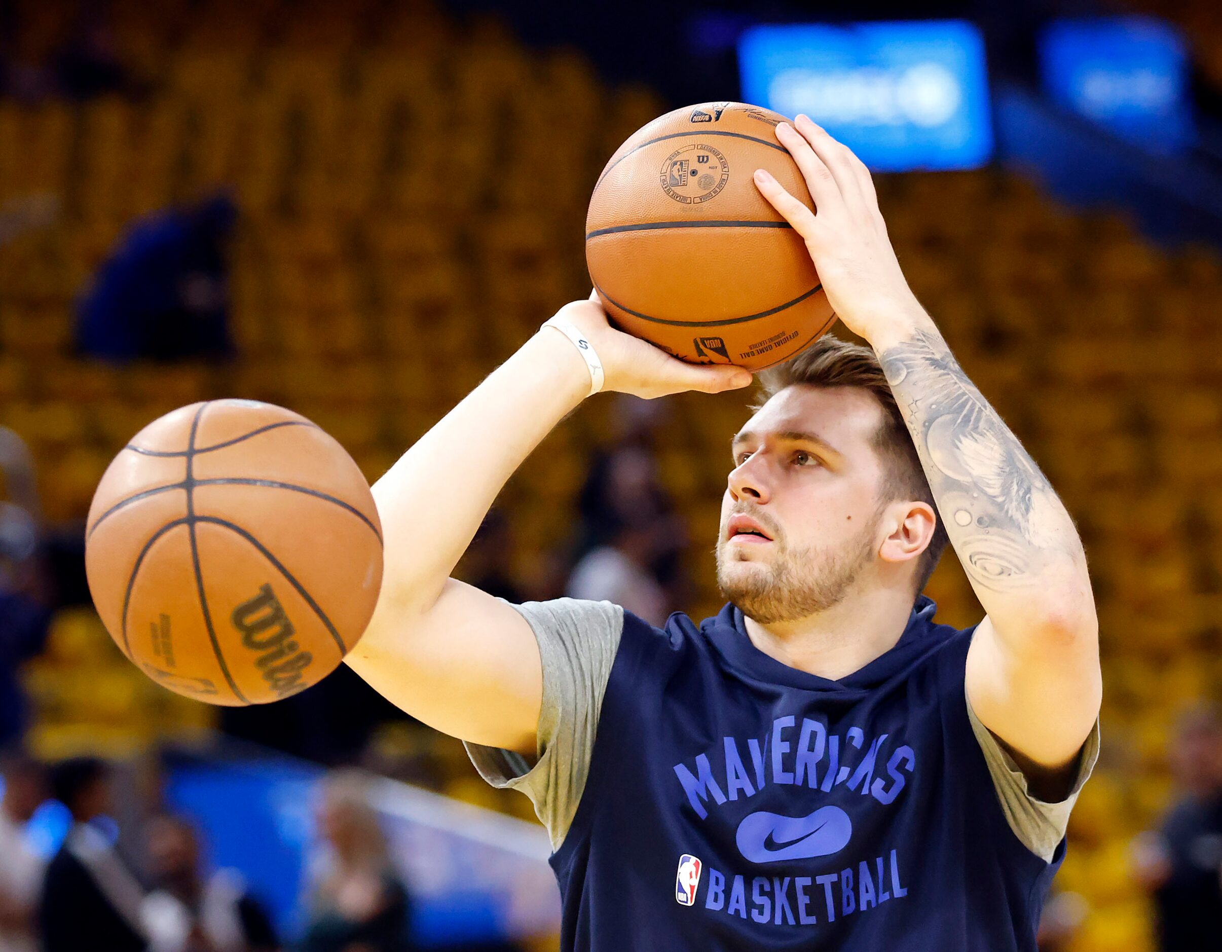 Dallas Mavericks guard Luka Doncic warms up before facing the Golden State Warriors in Game...