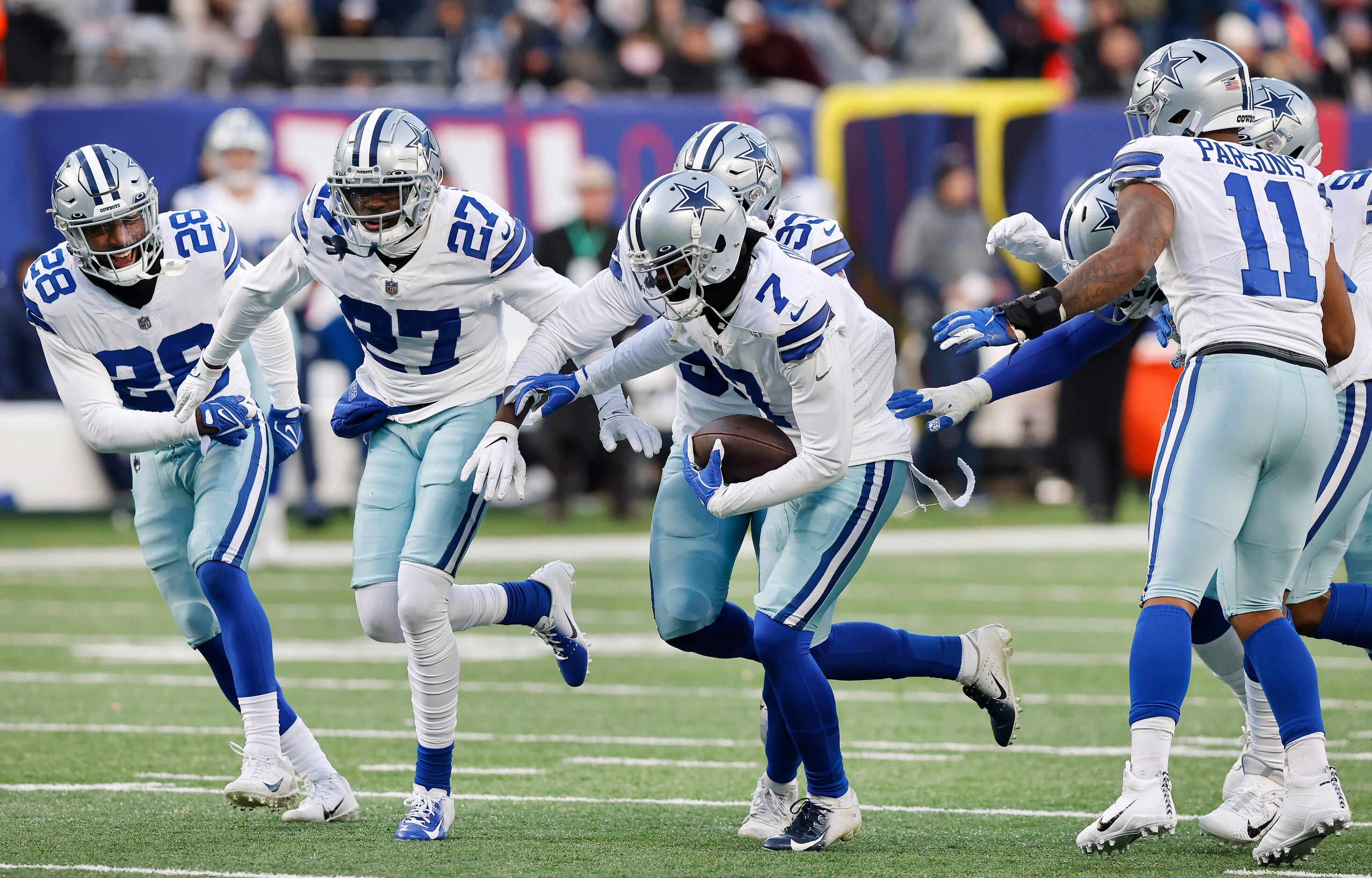 Dallas Cowboys cornerback Trevon Diggs (7) races to the end zone with the football after the...