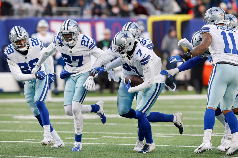 Dallas Cowboys cornerback Trevon Diggs (7) races to the end zone with the football after the...