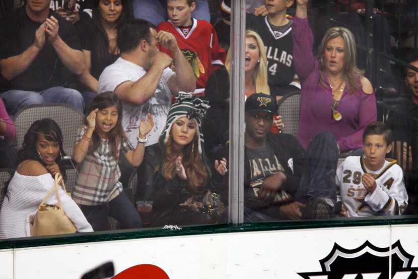 A young girl and the fans around Khloe Kardashian and husband Lamar Odom celebrate the only...
