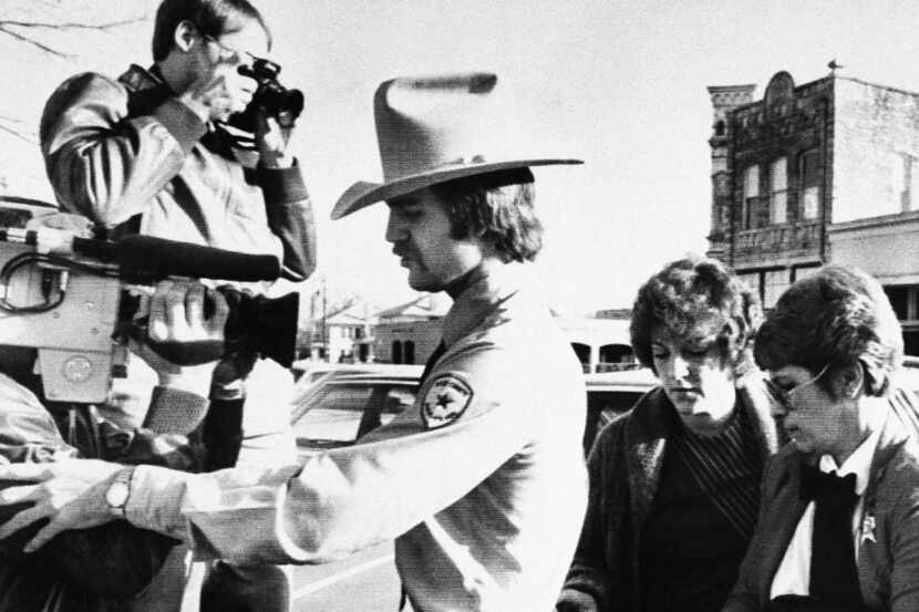 On Feb. 16, 1984, Genene Jones (second from right) was escorted into the Williamson County...