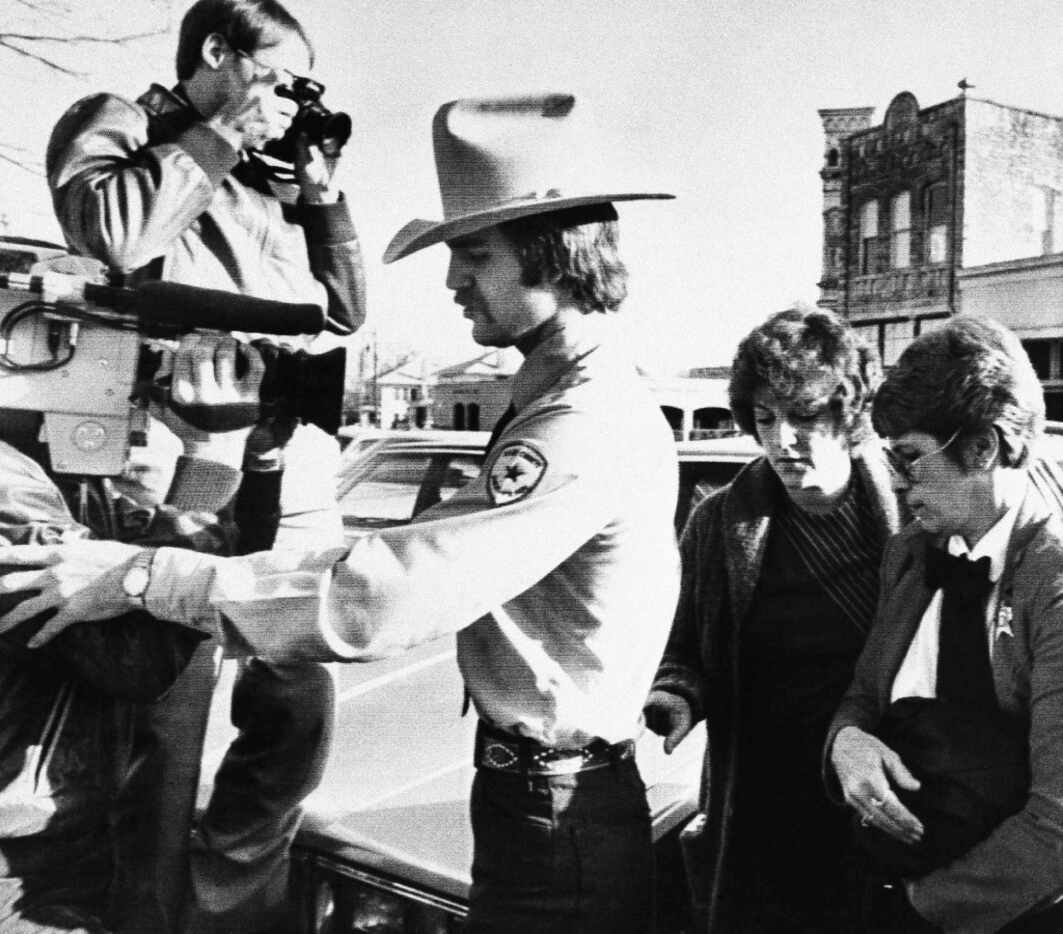 On Feb. 16, 1984, Genene Jones (second right) was escorted into the Williamson County...