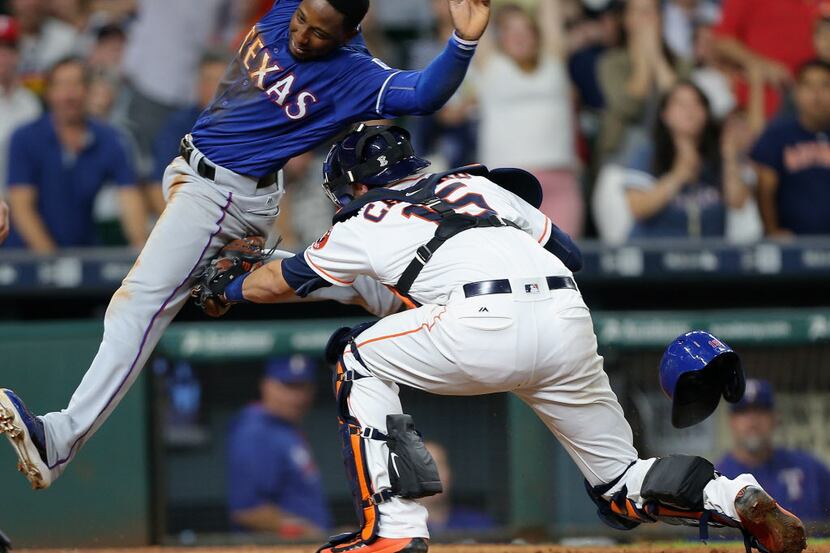 HOUSTON, TX - SEPTEMBER 13:  Jurickson Profar #19 of the Texas Rangers is tagged out by...