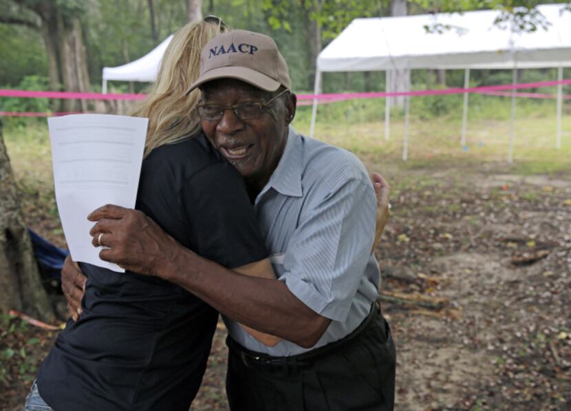 University of South Florida assistant professor Erin Kimmerle hugs Elmore Bryant at the Boot...