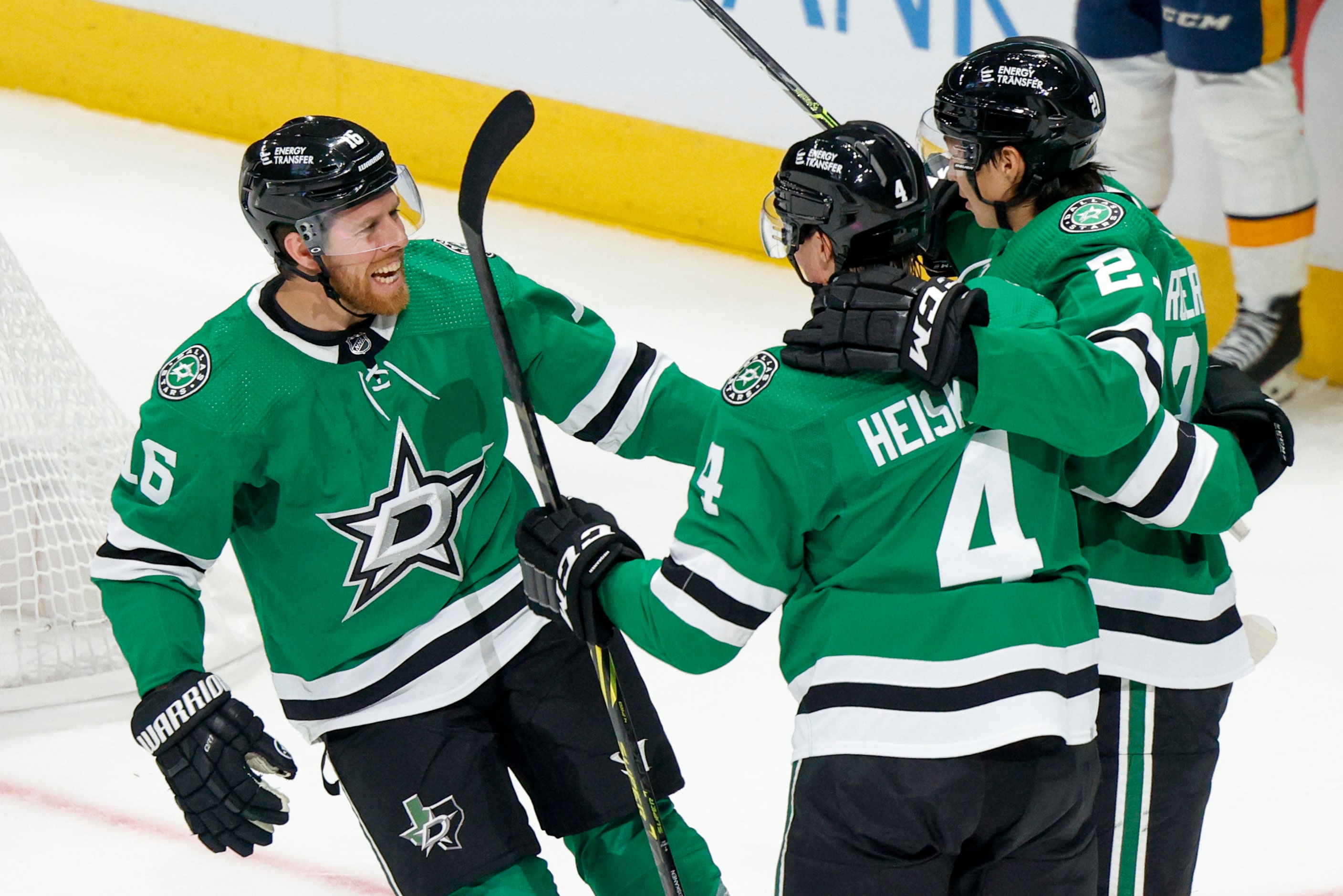 Dallas Stars center Joe Pavelski (16) celebrates a goal with defenseman Miro Heiskanen (4)...