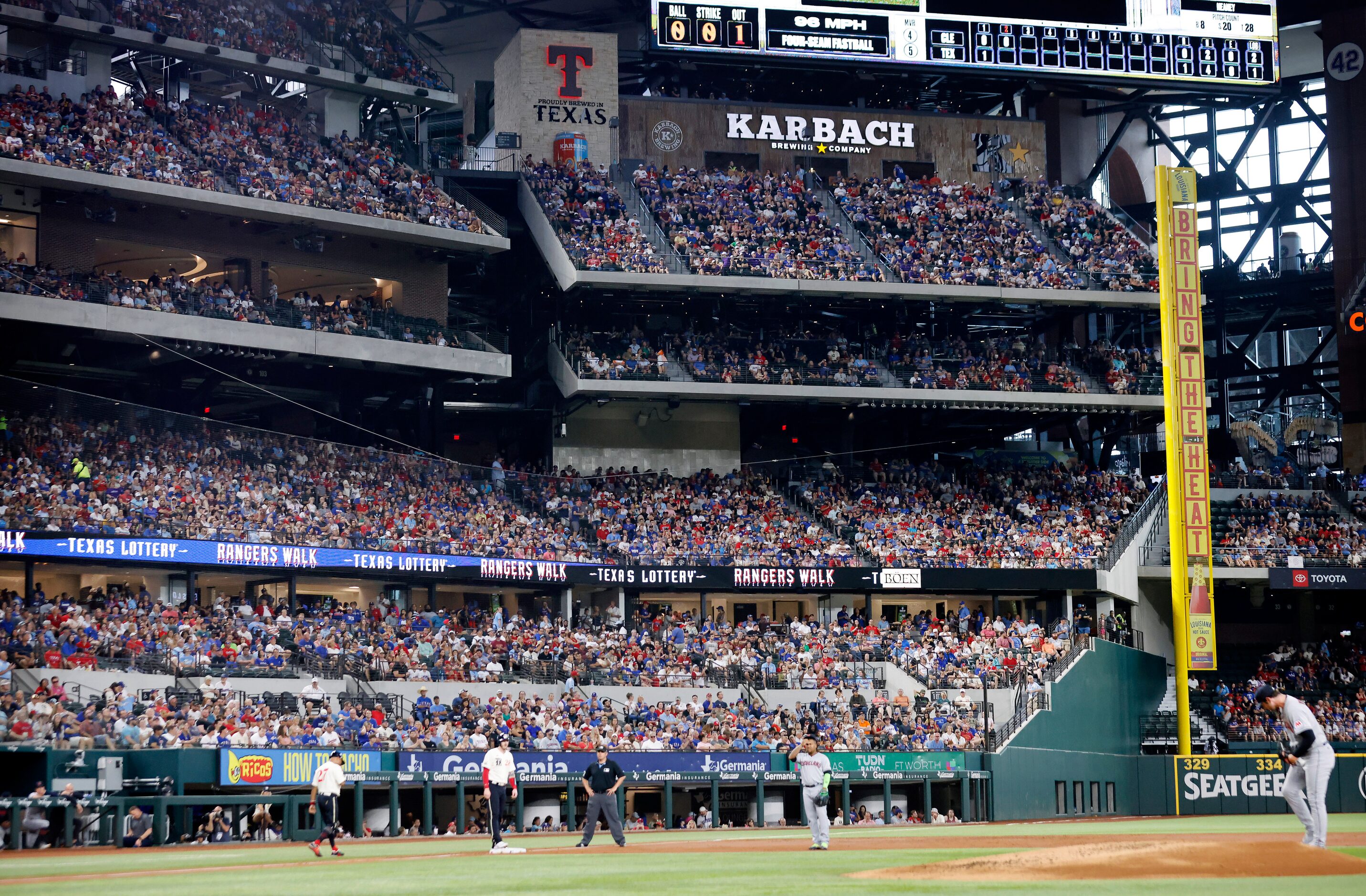 The stands were full of fans as the Texas Rangers faced the Cleveland Guardians during the...