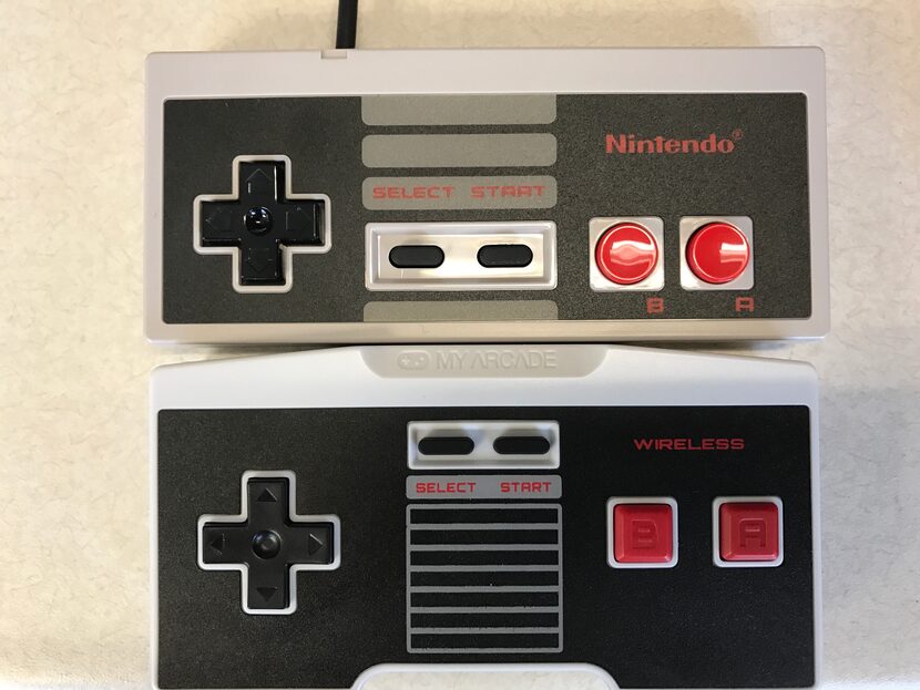 Top: Nintendo's official NES Classic controller. Bottom: The My Arcade Wireless Gamepad