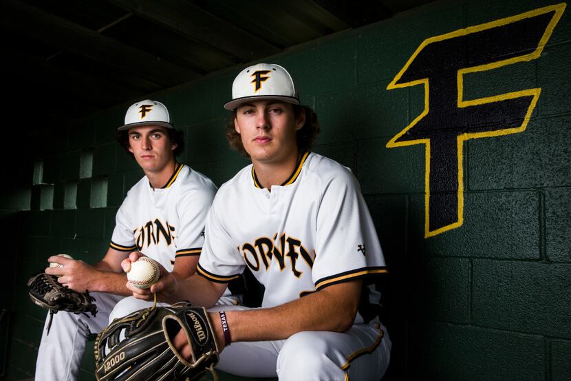 Ferny High School pitchers Jonathan Childress (21) and Mason Englert (8) pose for a portrait...
