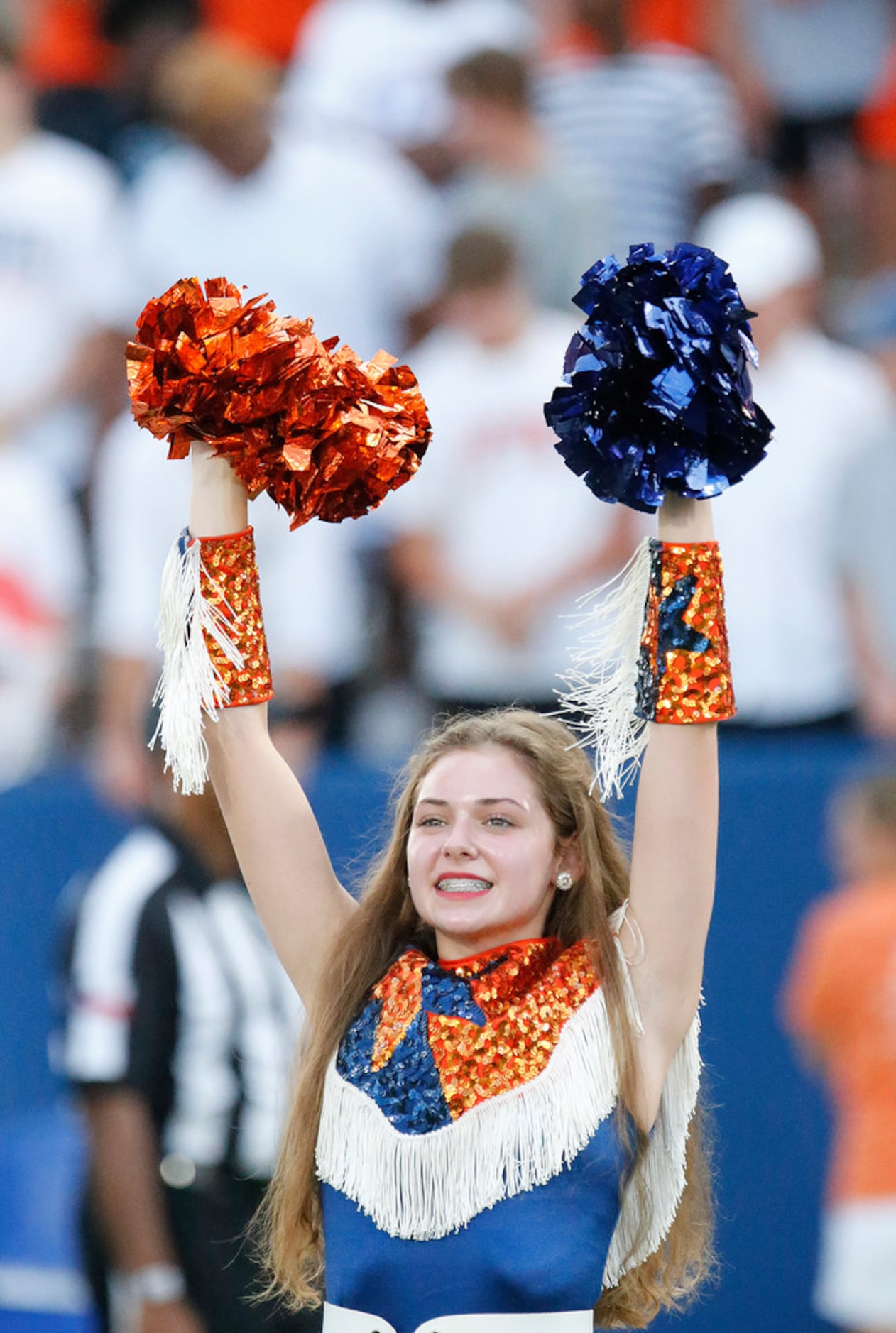 Mary Jordan, 15, with the McKinney North High School Northstars drill team, stands at...