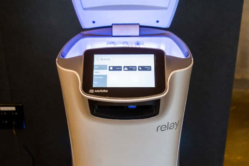 A Savioke Relay robot butler, nicknamed "botler," made to help with deliveries to guest...