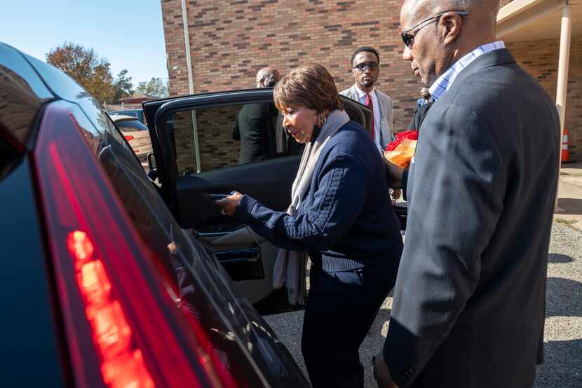 U.S. Rep. Eddie Bernice Johnson steps into a vehicle after speaking and announcing that she...