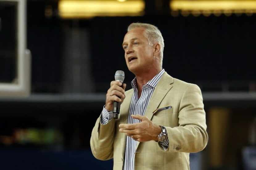 Former Dallas Cowboys player Daryl Johnston speaks during the Reese's Final Four Slant...