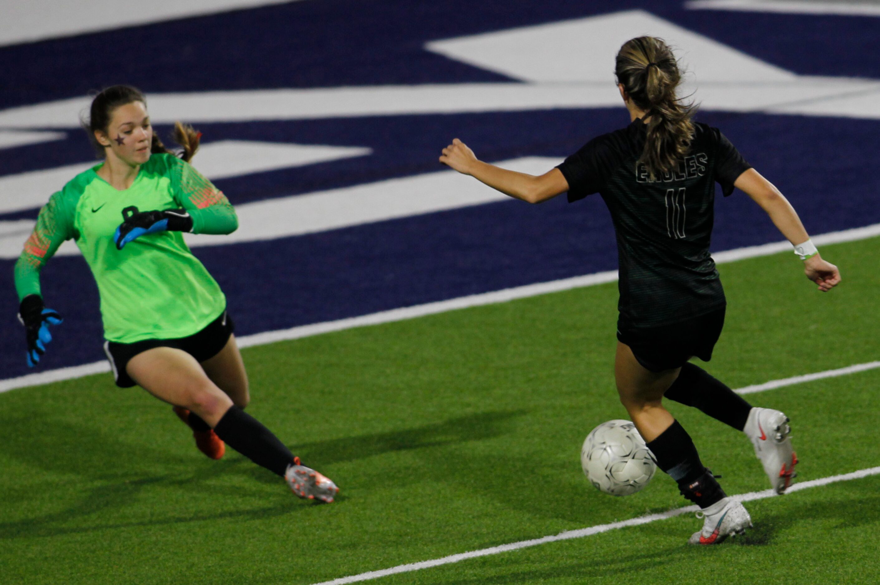 Coppell goalkeeper Zoe Goodale (0), left, aggressively leaves the net to charge Prosper's...