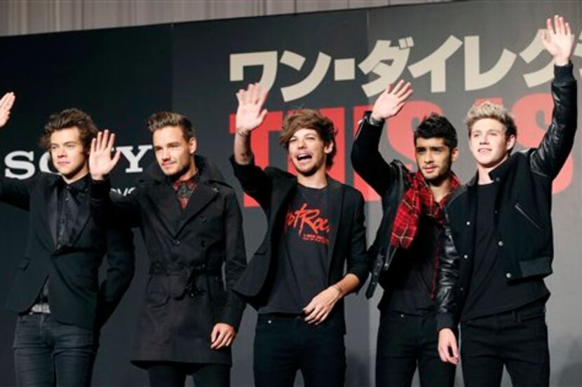FILE- In this March 25, 2015 file photo, members of One Direction, from left, Harry Styles,...