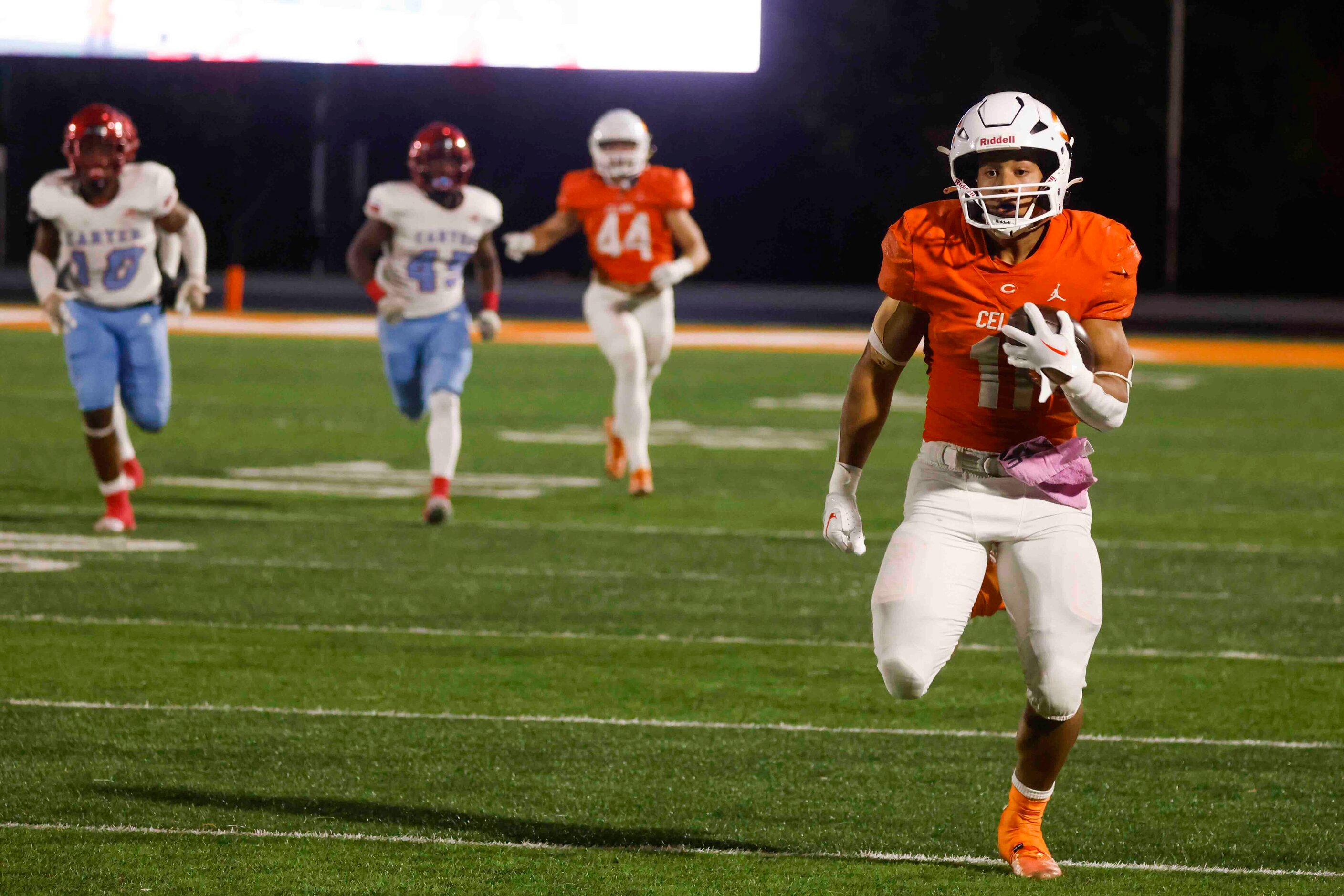 Celina High School’s Gabe Gayton (11) competes a touchdown against David W. Carter High...