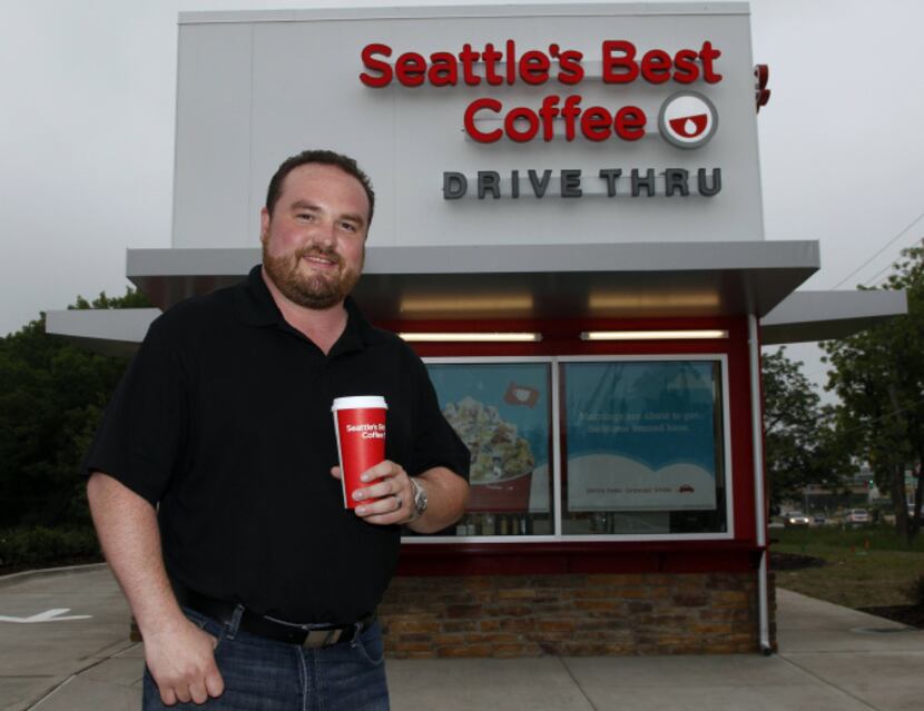 Dave Thompson, operations manager of Seattle's Best Coffee, is getting ready to open 10...