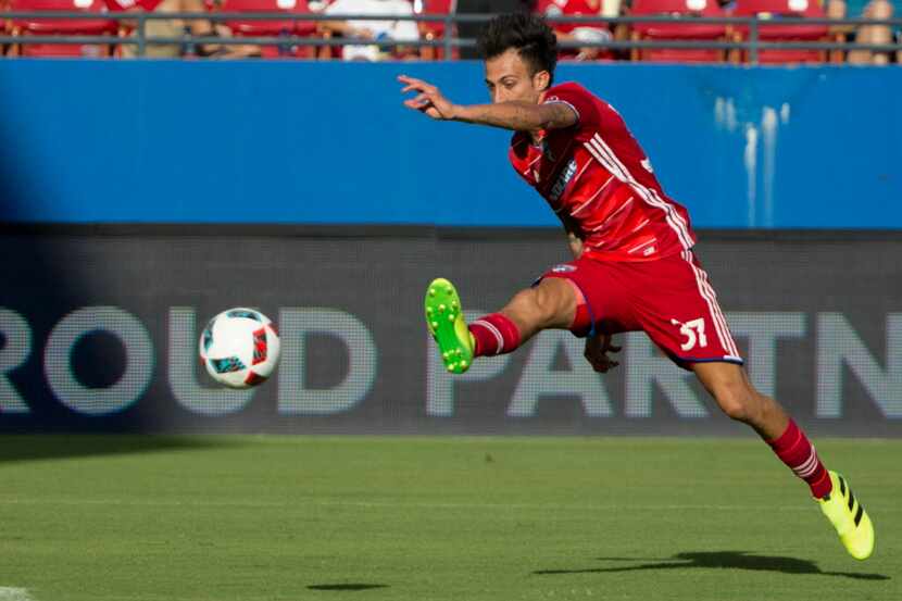 FC Dallas forward Maximiliano Urruti (37) shoots the ball for a goal during MLS match...