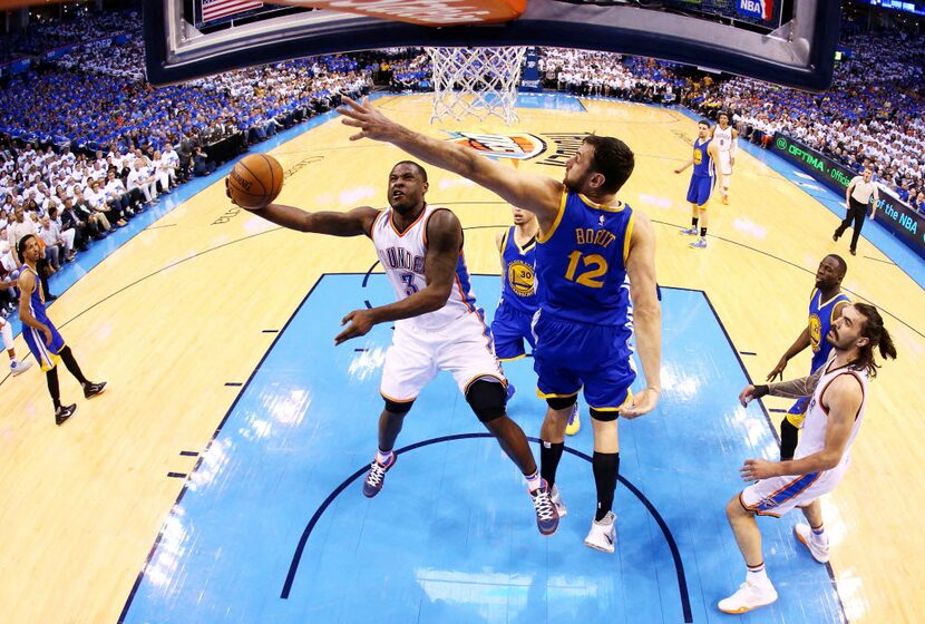 OKLAHOMA CITY, OK - MAY 22:  Dion Waiters #3 of the Oklahoma City Thunder goes up against...