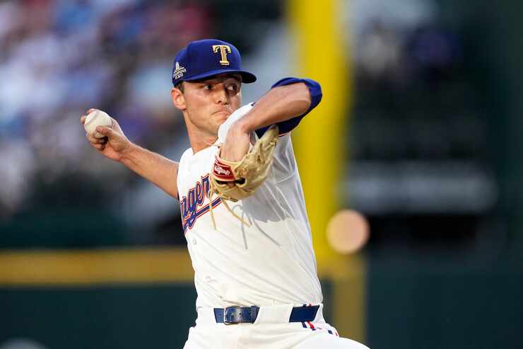 Texas Rangers starting pitcher Jack Leiter throws to a Cleveland Guardians batter during the...