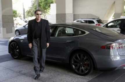  In June 2014, then-Gov. Rick Perry droveÂ up to a news conference in a Tesla Motors Type S...