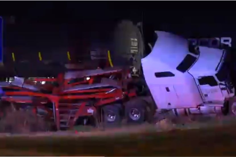 An image from the scene where a train crashed into a semi-truck in Keller, taken from...