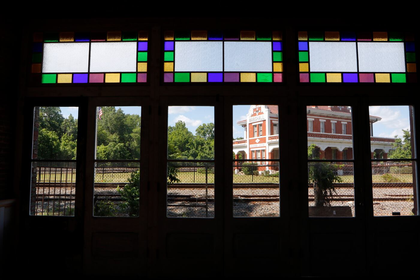 The Texas Pacific Museum is framed by the window of the historic Ginocchio Hotel in...