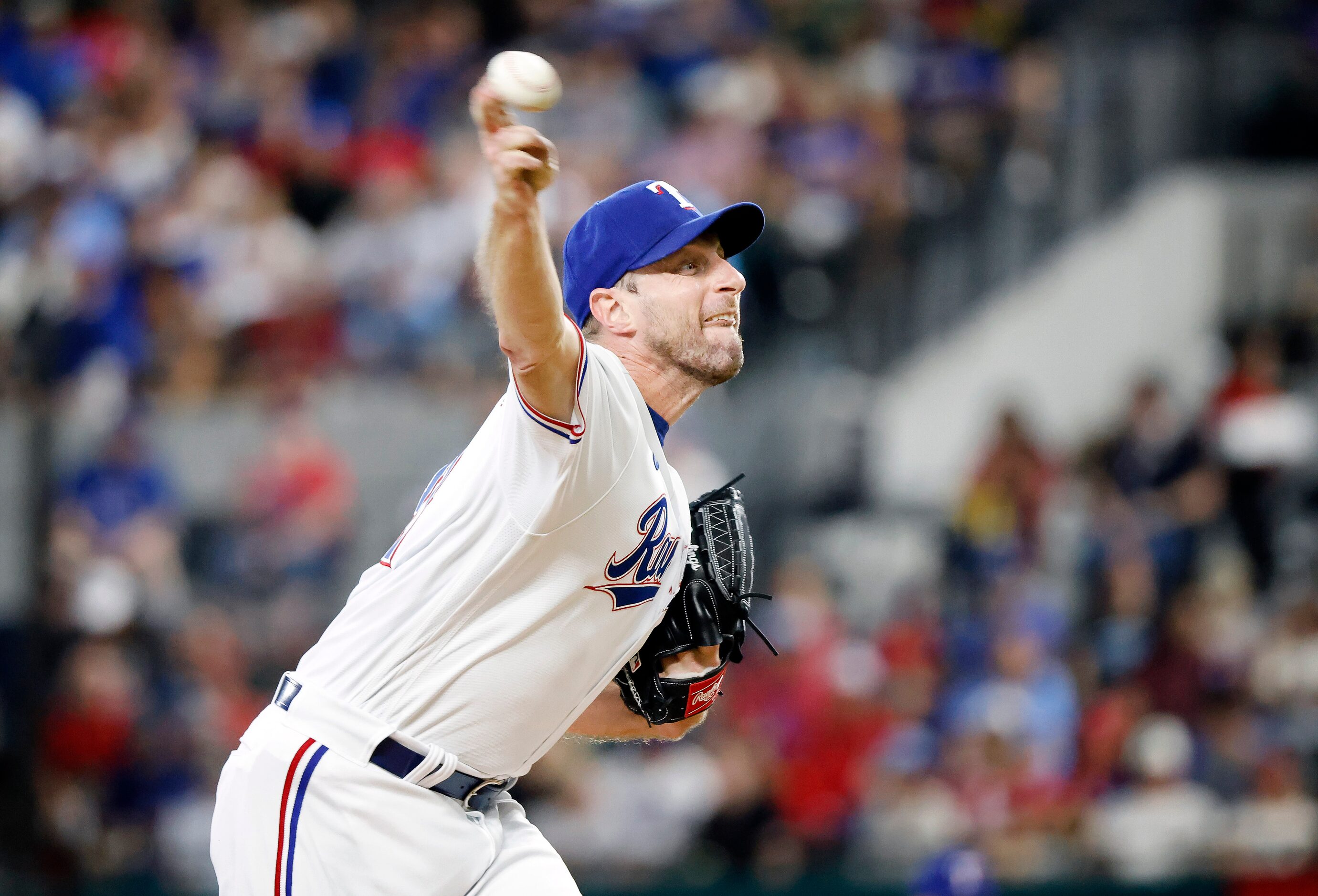 Texas Rangers starting pitcher Max Scherzer (31) throws against the Chicago White Sox during...