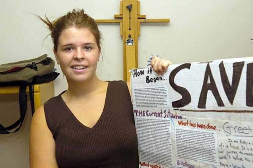 
In this May 30, 2013, photo, Kayla Mueller is shown after speaking to a group in Prescott,...