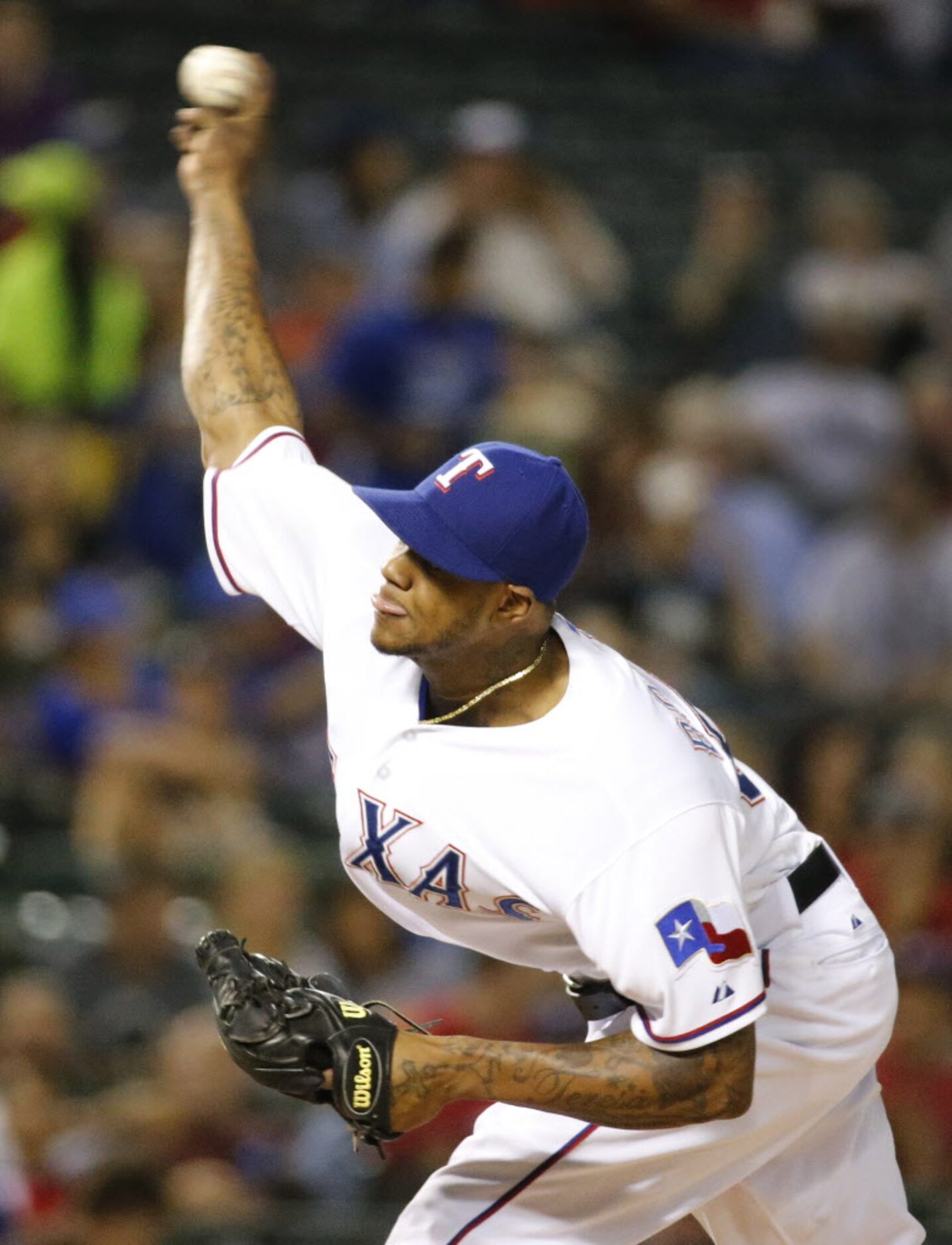 Texas starting pitcher Lisalverto Bonilla throws a fifth-inning pitch during the Houston...