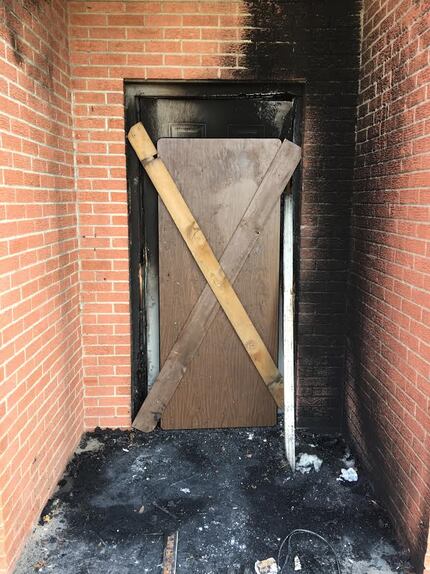 The fire damage was mostly contained to the area around an exterior door.
