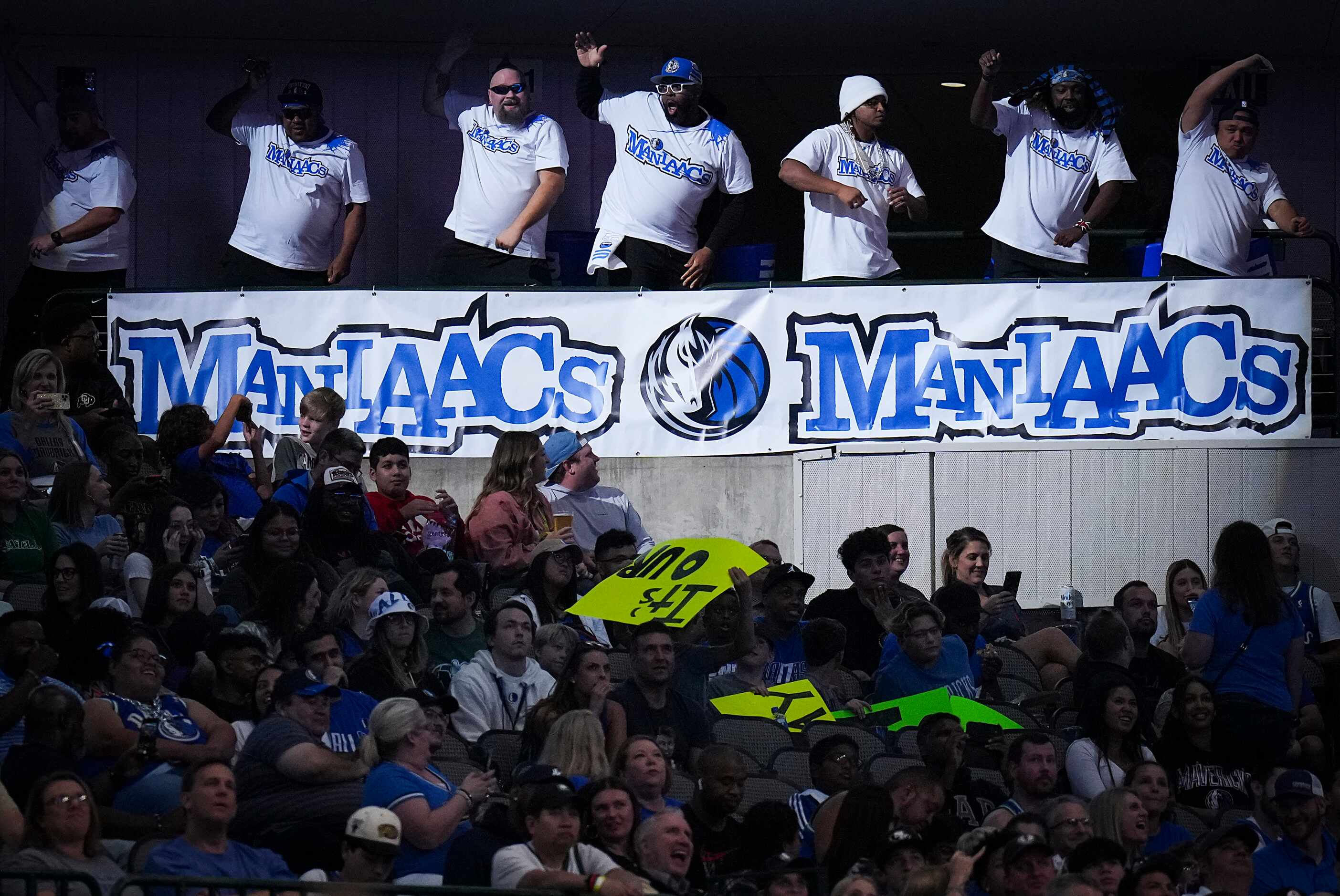 The Mavs Maniaacs perform during the first half of an NBA preseason basketball game between...
