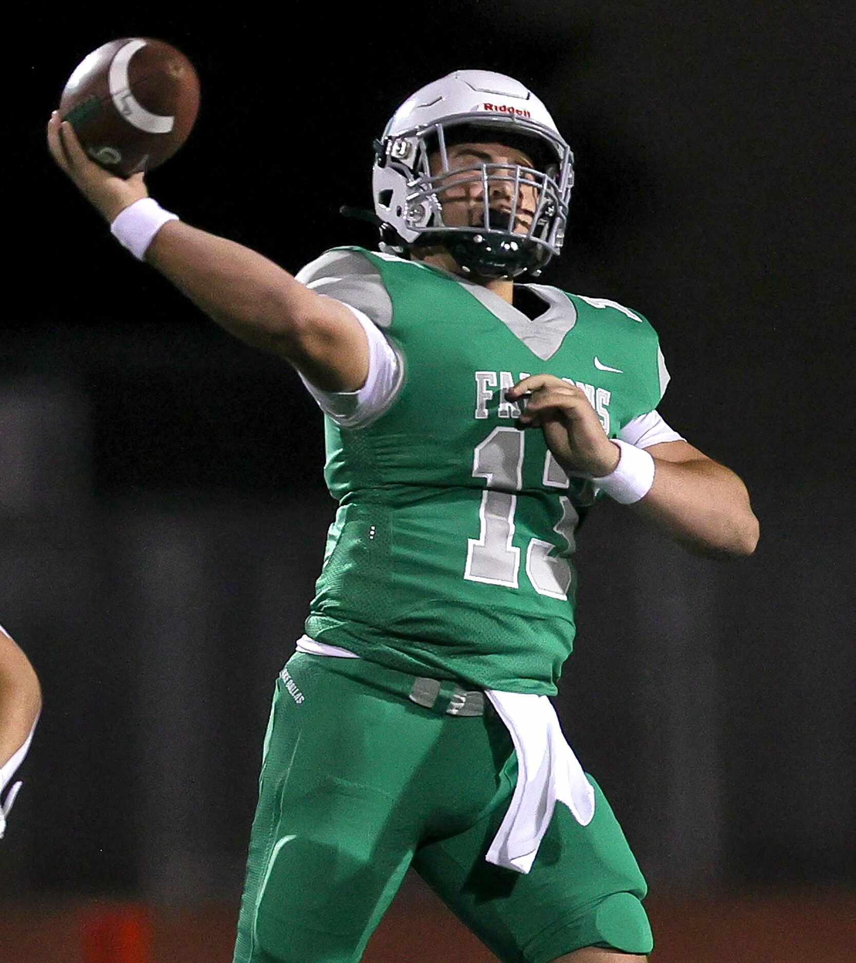 Lake Dallas quarterback Cade Bortnem attempts a pass against Denton during the first half of...